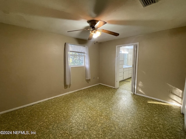 empty room with ceiling fan