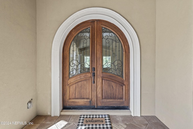 view of exterior entry with french doors