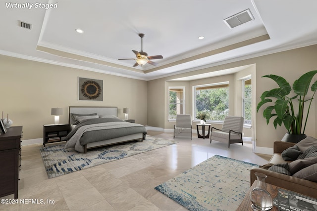 bedroom featuring light tile patterned floors, a raised ceiling, ceiling fan, and crown molding