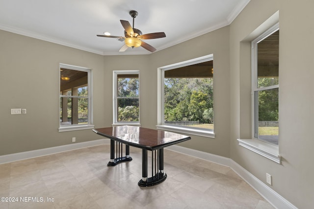 home office featuring crown molding, plenty of natural light, and ceiling fan