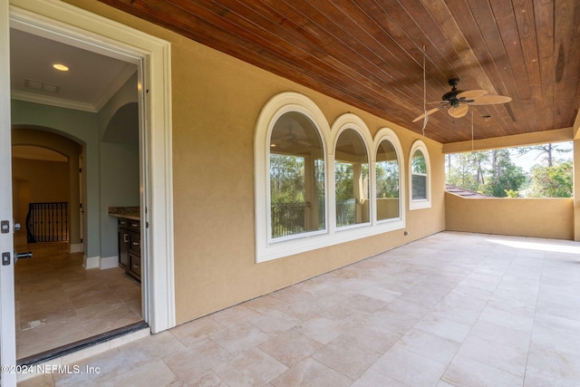 view of patio with ceiling fan