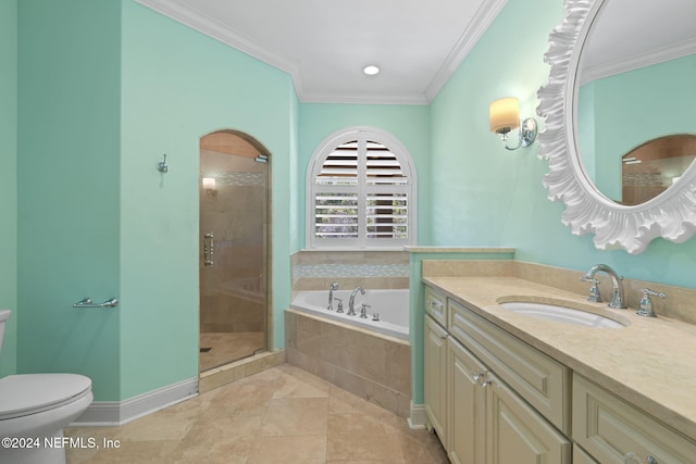 full bathroom featuring toilet, vanity, independent shower and bath, and ornamental molding