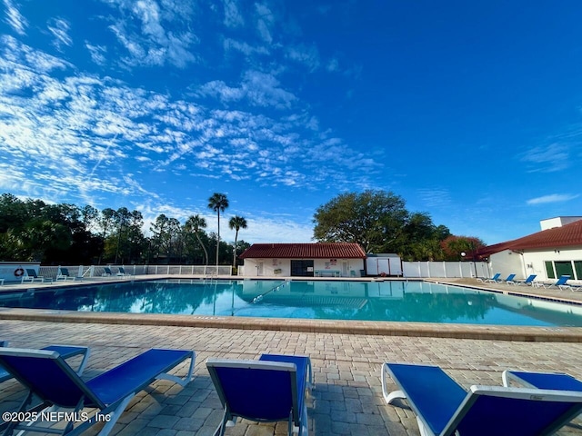 view of swimming pool with a patio