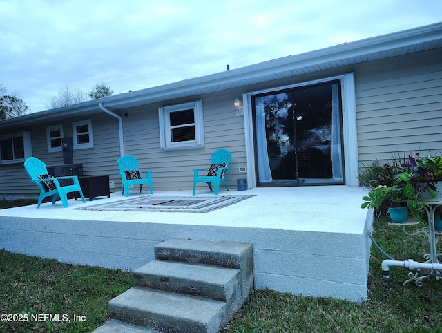 rear view of house with a patio area