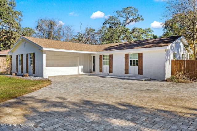 ranch-style house with a garage