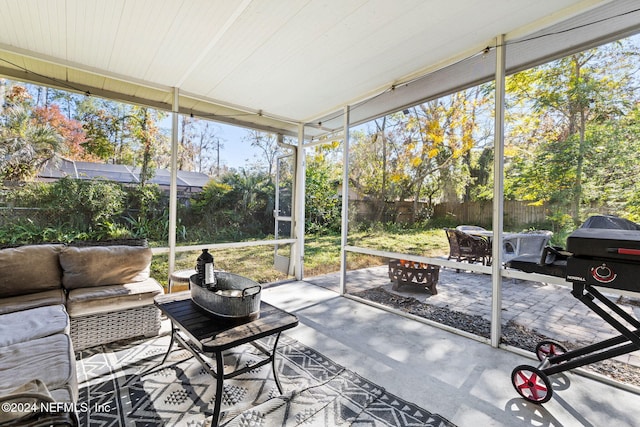 sunroom featuring a healthy amount of sunlight