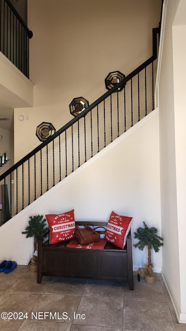 stairway with a high ceiling