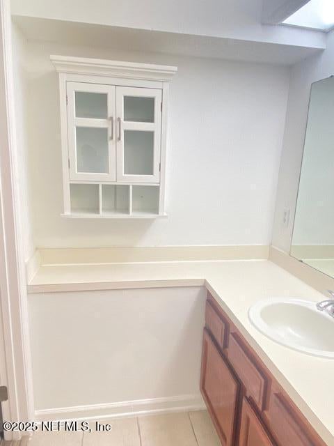 bathroom featuring vanity and tile patterned floors