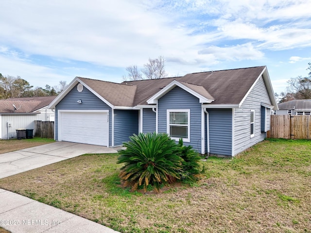 ranch-style home with a garage and a front lawn