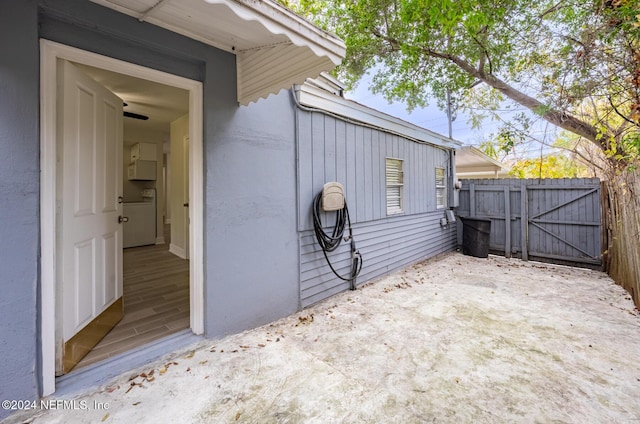 exterior space featuring washer / clothes dryer