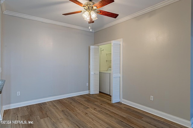 unfurnished bedroom with wood-type flooring, washer / clothes dryer, ceiling fan, and crown molding