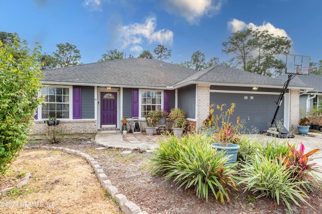 single story home featuring a garage