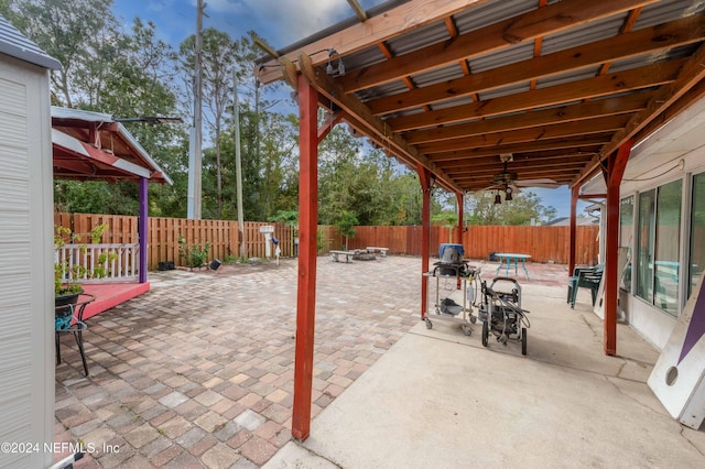 view of patio with an outdoor fire pit