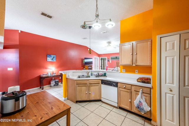 kitchen featuring pendant lighting, dishwasher, lofted ceiling, sink, and kitchen peninsula