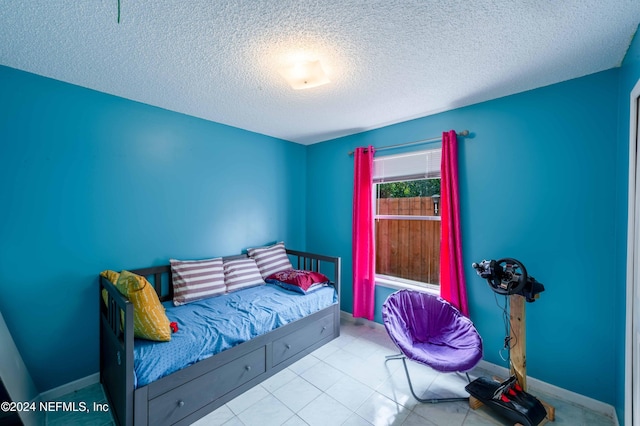 bedroom with a textured ceiling