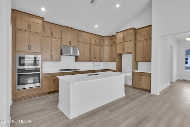 166 Blue Hampton Dr, Ponte Vedra, FL 32081 - kitchen featuring stainless steel appliances, a sink, under cabinet range hood, light countertops, and a kitchen island with sink