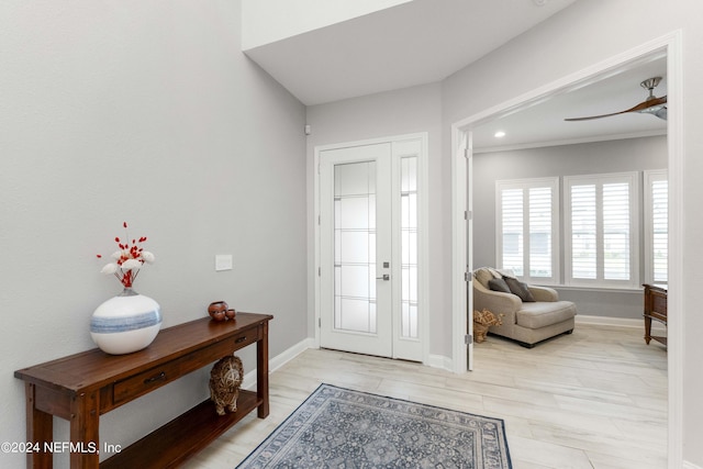 entrance foyer featuring ceiling fan