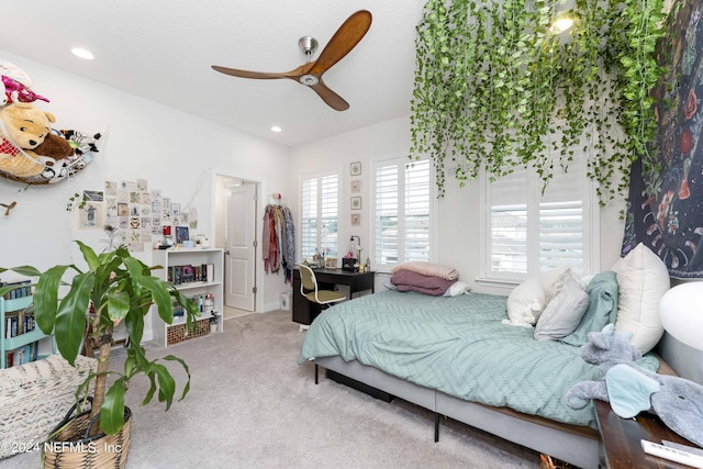 carpeted bedroom with ceiling fan