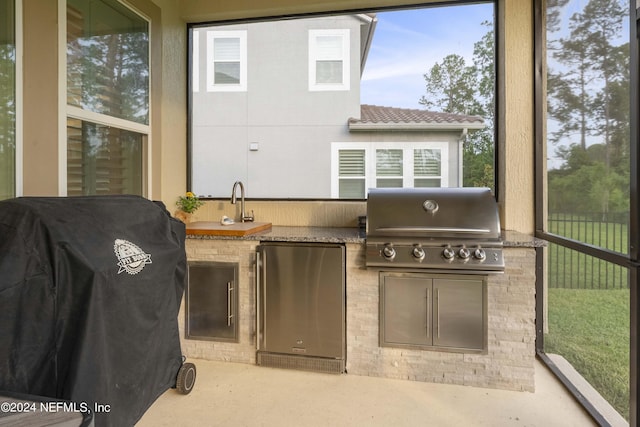 view of patio with a grill and area for grilling