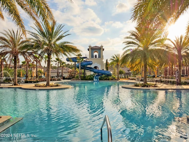 view of pool featuring a water slide