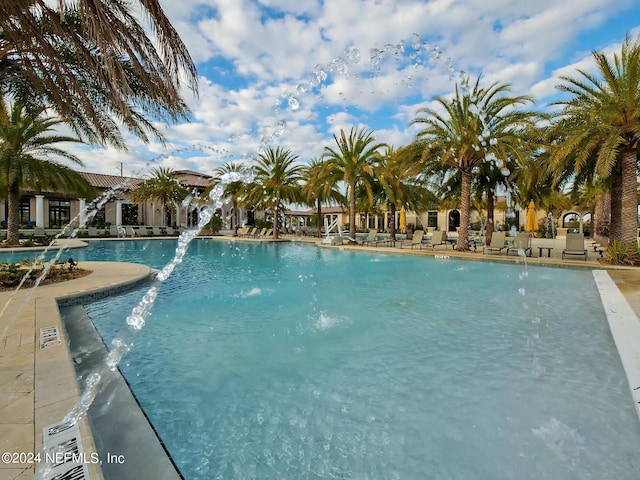 view of swimming pool featuring a patio area and pool water feature