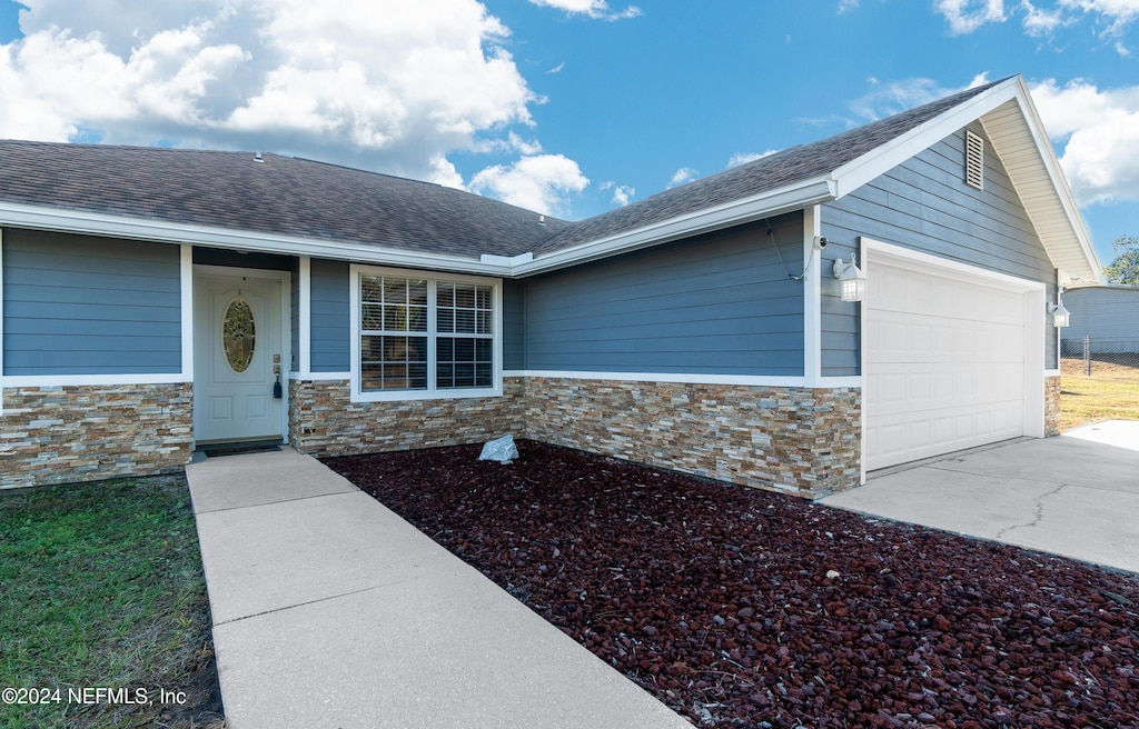 view of front of house with a garage