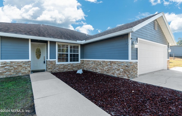 view of front of house with a garage