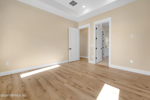 spare room with light wood-type flooring