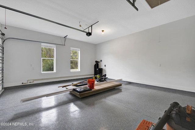 garage featuring a baseboard radiator