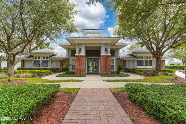 view of front facade featuring french doors