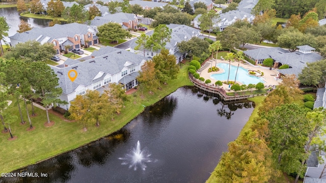 drone / aerial view with a water view