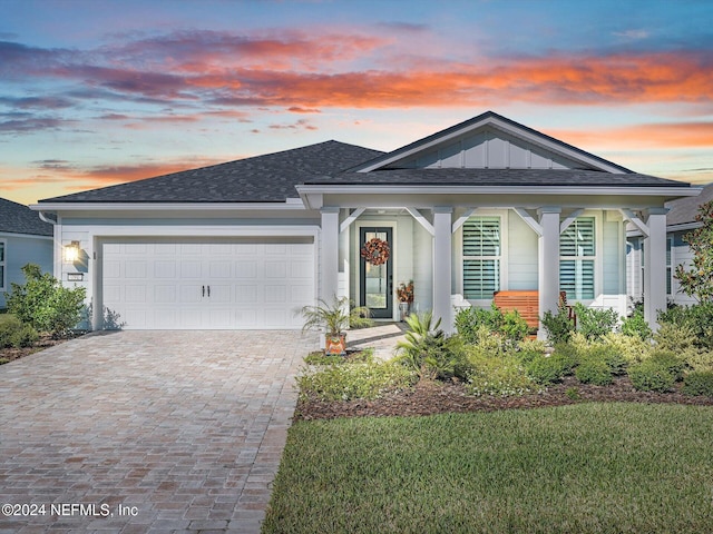 view of front of property featuring a garage