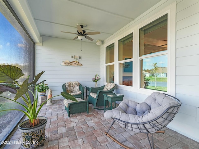 view of patio / terrace featuring ceiling fan