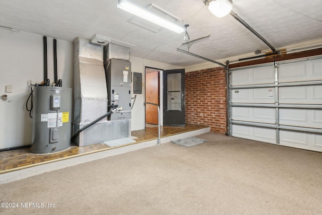 garage featuring electric water heater and electric panel