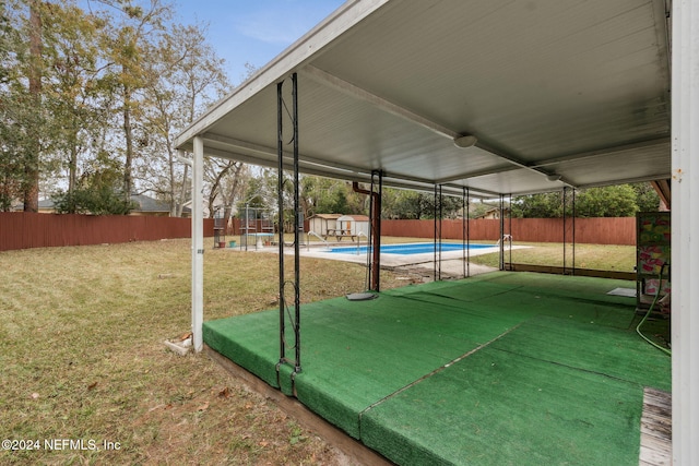 exterior space featuring a fenced in pool