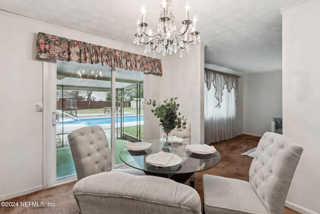 carpeted dining room featuring a textured ceiling and a notable chandelier