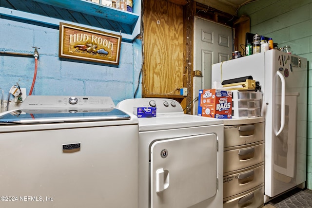 washroom with independent washer and dryer