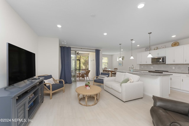 living room featuring sink