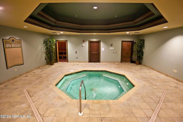 view of pool featuring an indoor hot tub