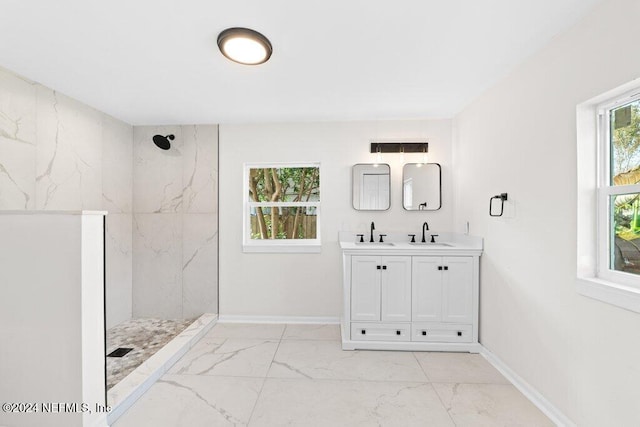 bathroom featuring vanity and walk in shower