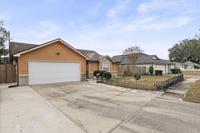 single story home with a front lawn and a garage