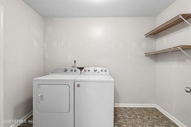 clothes washing area with independent washer and dryer