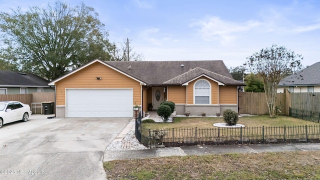 single story home with a front yard and a garage