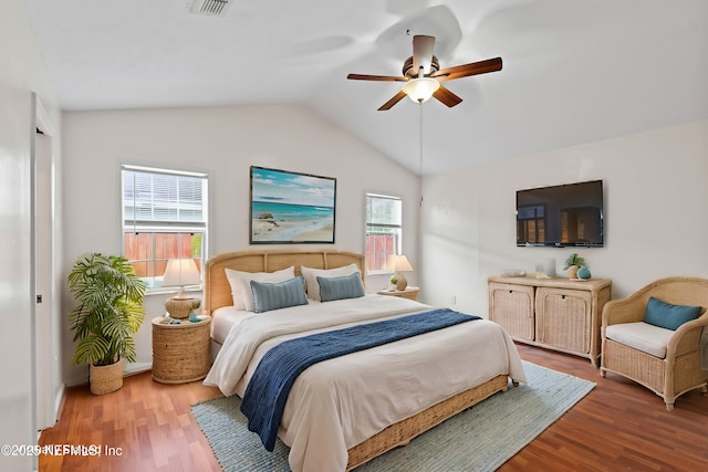 bedroom featuring vaulted ceiling, ceiling fan, and wood-type flooring