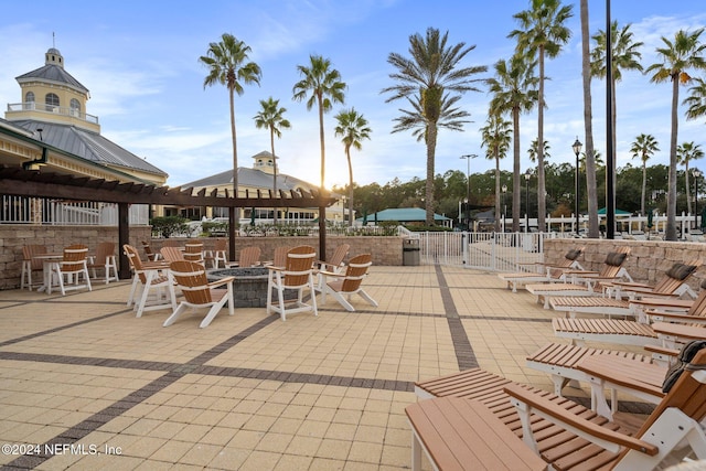 view of patio / terrace with an outdoor fire pit