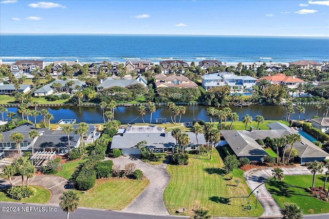 drone / aerial view with a water view