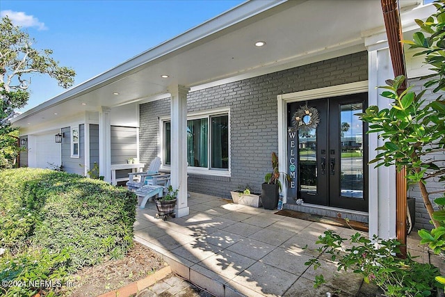 property entrance with french doors