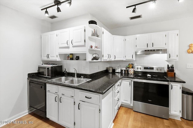 kitchen featuring white cabinetry, sink, stainless steel appliances, track lighting, and light wood-type flooring