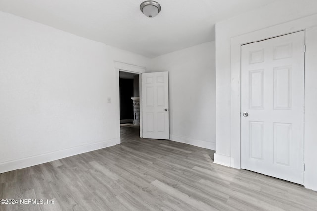 unfurnished bedroom featuring light hardwood / wood-style floors