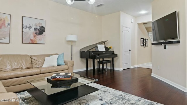 living room featuring dark hardwood / wood-style flooring